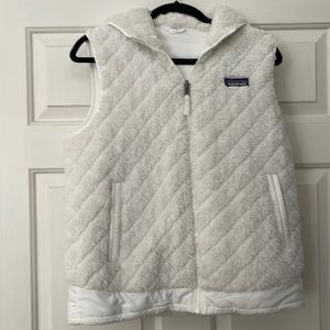 Fleece lined vest with hood by Patagonia.